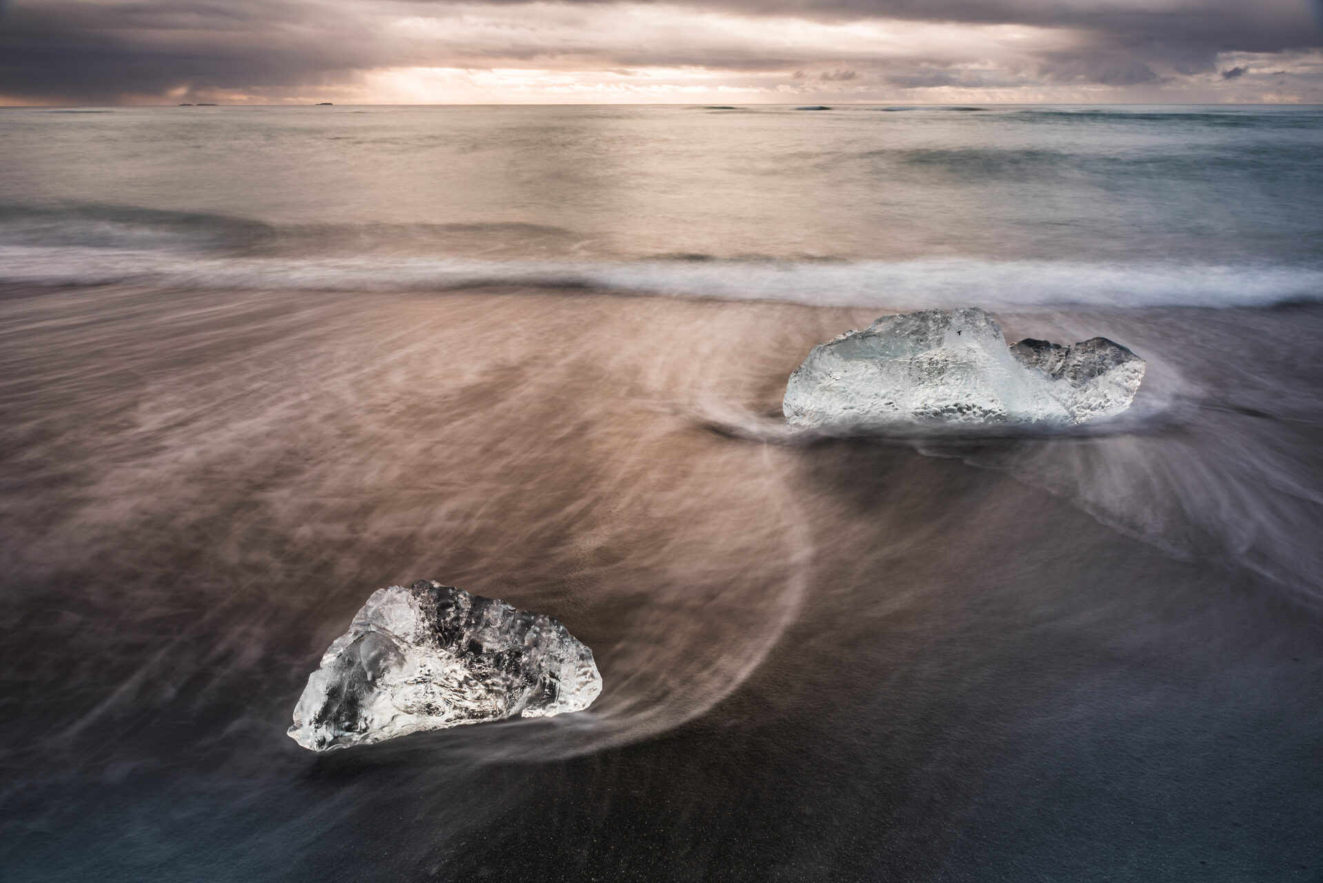 Iceland Landscape Photography Icebergs at sunrise on Jokulsarlon Beach a black volcanic sand beach in South East Iceland 2